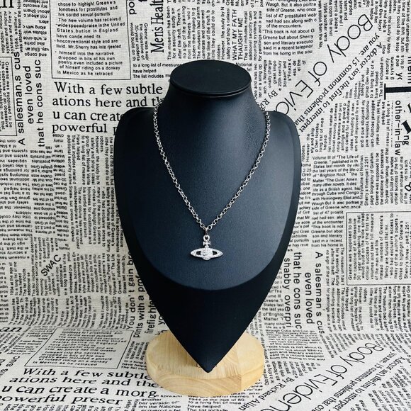 Vivienne Westwood Jewelry - NWT Vivienne Westwood Mini bas relief pendant silver